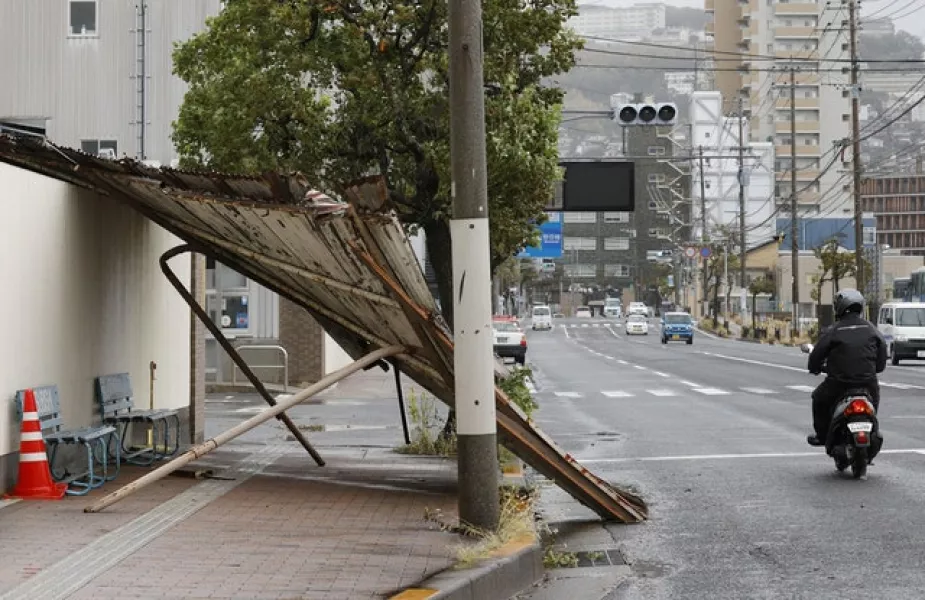 The typhoon has injured at least 20 people (Kyodo News via AP)