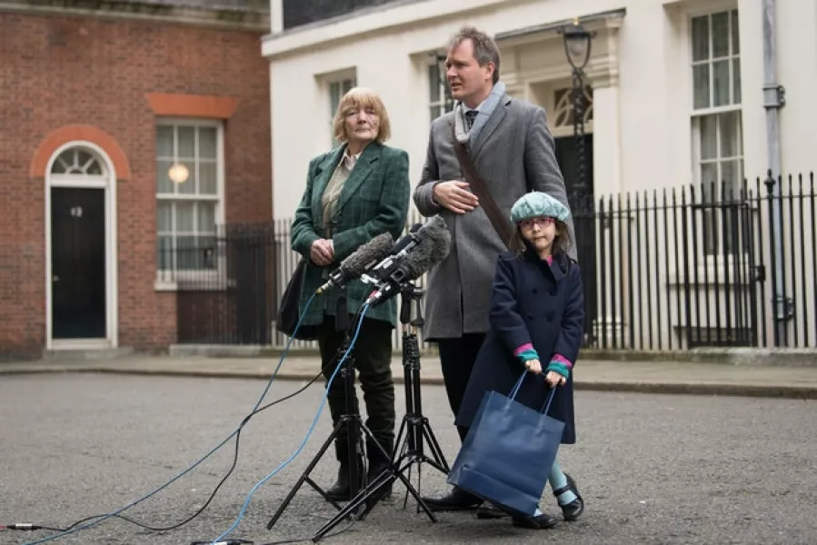 Gabriella Zaghari-Ratcliffe stands next to her father Richard Ratcliffe and his mother Barbara in Downing Street earlier this year (Stefan Rousseau/PA)