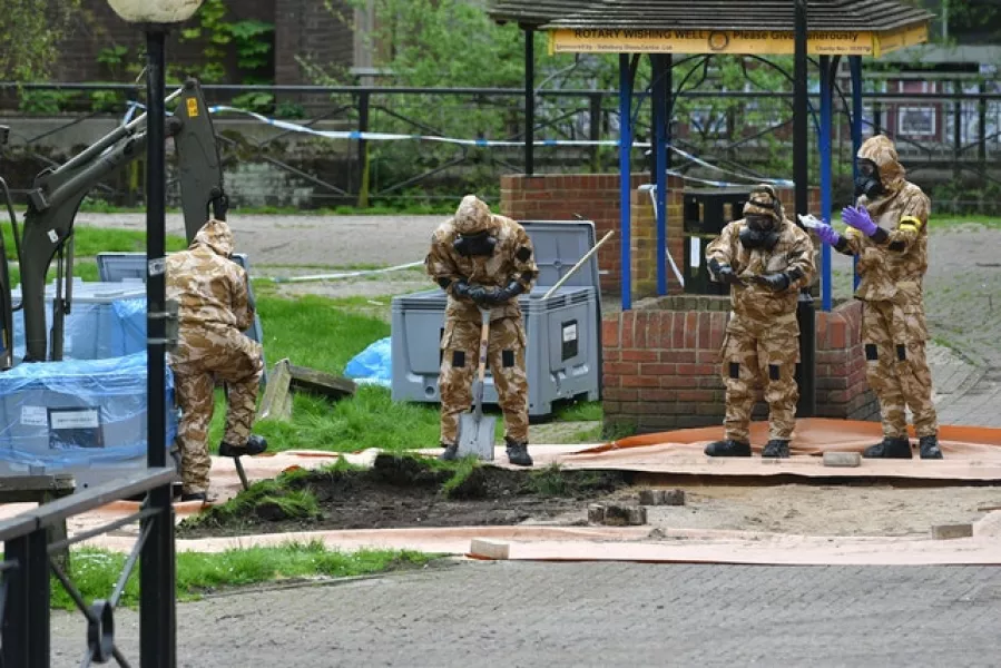 Military personnel at the site near the Maltings in Salisbury where Russian double agent Sergei Skripal and his daughter Yulia were found on a park bench after a nerve agent attack (Ben Birchall/PA)