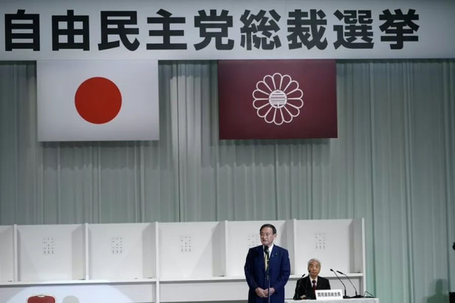 Despite a low-key image as Shinzo Abe’s right-hand man, Mr Suga has a tough reputation for getting the job done (AP)