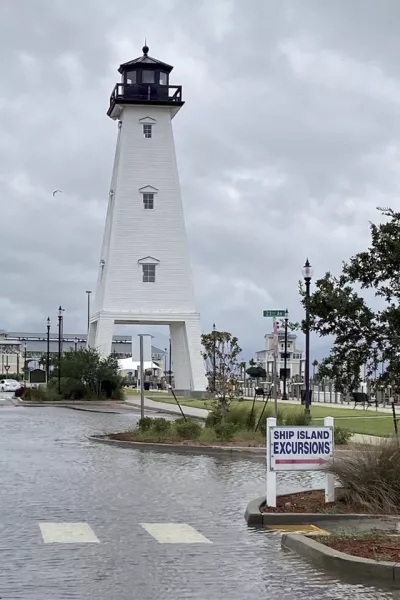 The car park adjacent to the Jones Park Lighthouse in Gulfport, Mississippi under water (Hunter Dawkins/The Gazebo Gazette/AP)