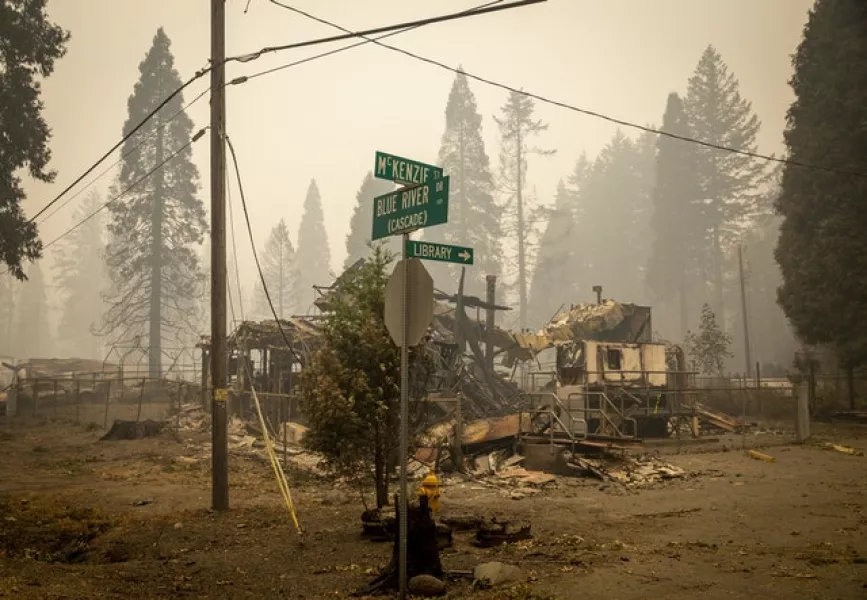 Scorched land and property in Blue River, Oregon (Andy Nelson/The Register-Guard via AP, Pool)