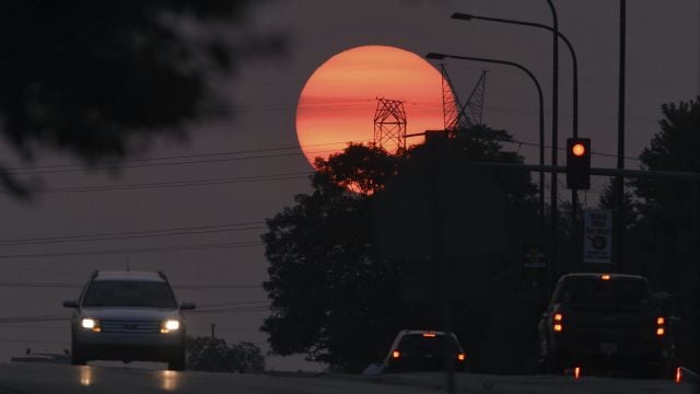 Stunning Sunsets And Hazy Skies Seen Thousands Of Miles Away From Us Wildfires