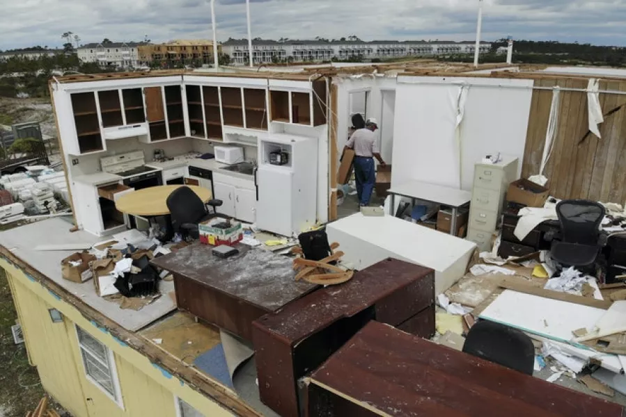 Joe Mirable surveys the damage to his business after Hurricane Sally moved through Perdido Key, Florida (Angie Wang/AP)