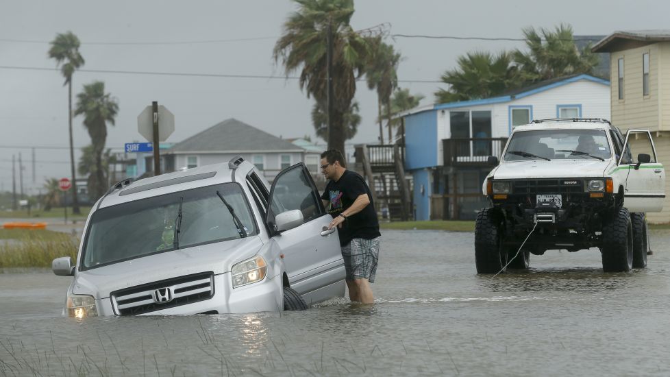 Tropical Storm Stalls Along Texas Coast, Flooding City Streets