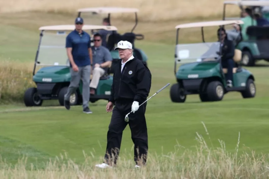 US President Donald Trump plays a round of golf on the Trump Turnberry resort in South Ayrshire. Photo: Jane Barlow/PA