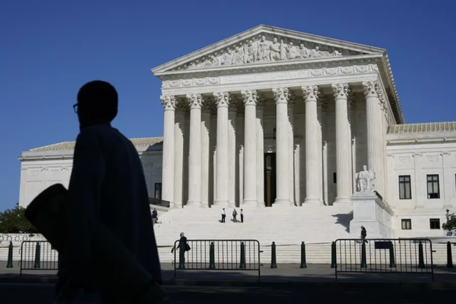 Officials stand on the Supreme Court steps on Capitol Hill (Patrick Semansky/AP)