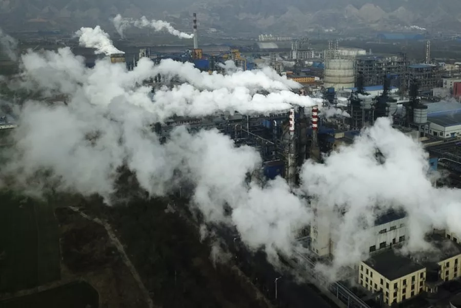Smoke and steam rise from a coal processing plant in Hejin in central China’s Shanxi Province (Sam McNeil, AP)