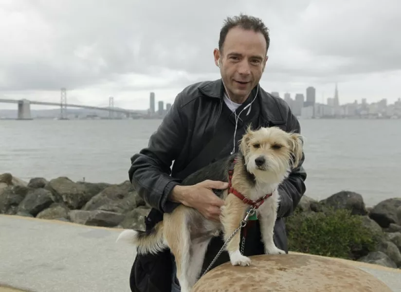 Timothy Ray Brown with his dog, Jack, in 2011 (Eric Risberg/AP)