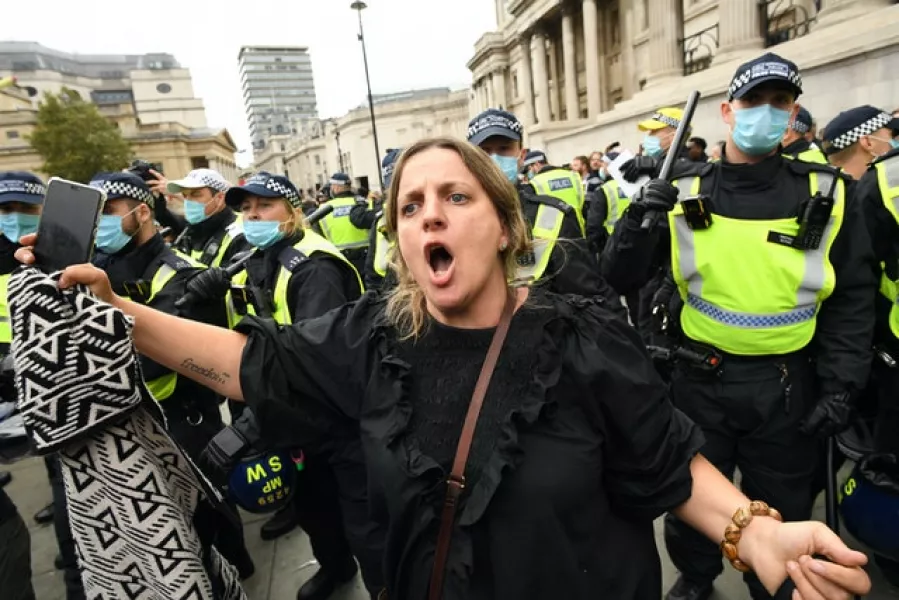 Protesters and police in Trafalgar Square (Stefan Rousseau/PA)