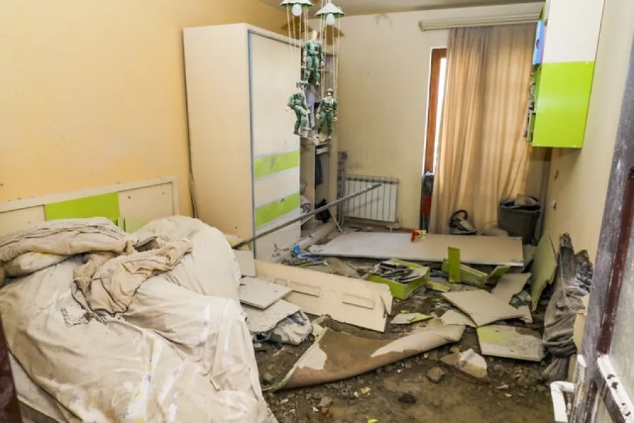Damage caused by shelling at a flat in Stepanakert (Edgar Kamalyan/Armenian Foreign Ministry via AP)