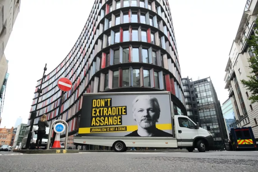 A mobile advertising board with a Don’t Extradite Assange message outside the Old Bailey, London (Aaron Chown/PA)