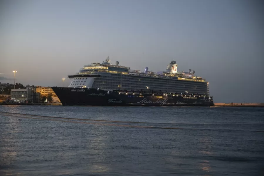 The Mein Schiff 6 cruise ship docked at Piraeus (Petros Giannakouris/AP)