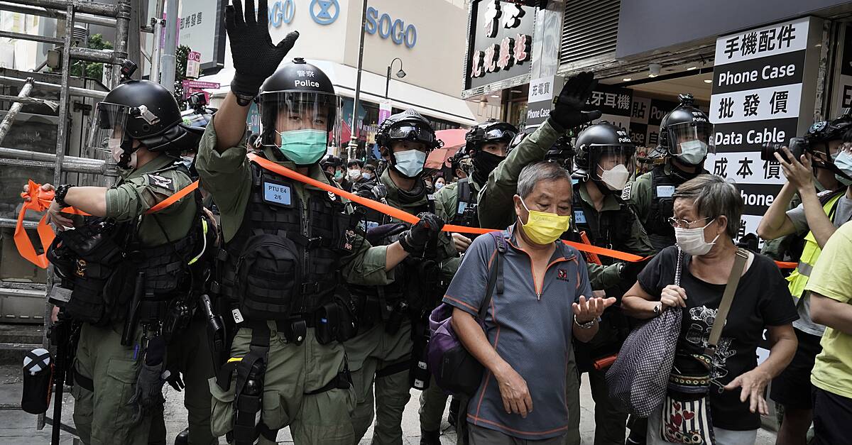 Hong Kong police arrest 60 for protesting on Chinese holiday