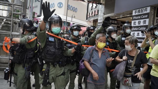 Hong Kong Police Arrest 60 For Protesting On Chinese Holiday