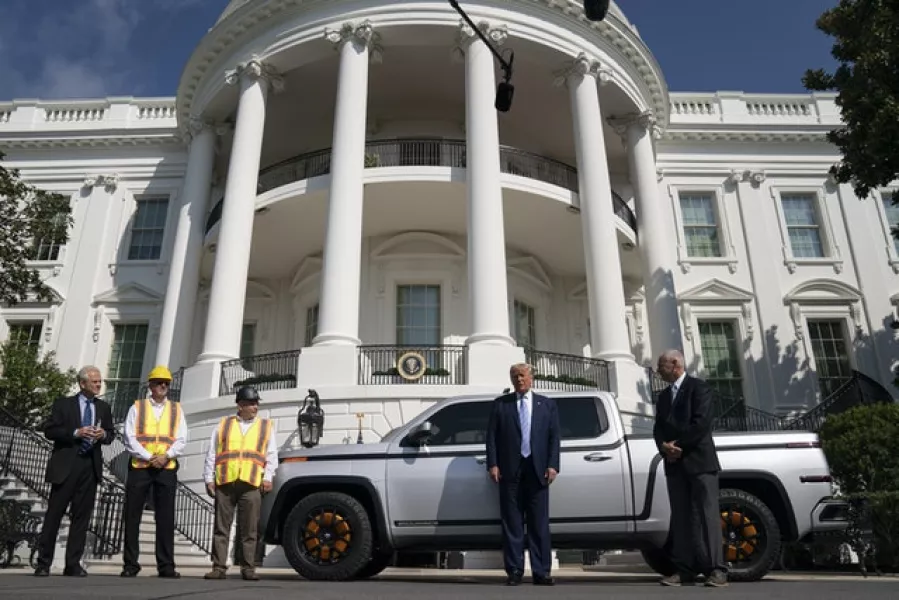 Mr Trump with Lordstown Motors CEO Steve Burns at the White House (AP)