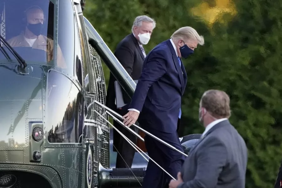 President Donald Trump arrives at Walter Reed National Military Medical Centre (Jacquelyn Martin/AP)