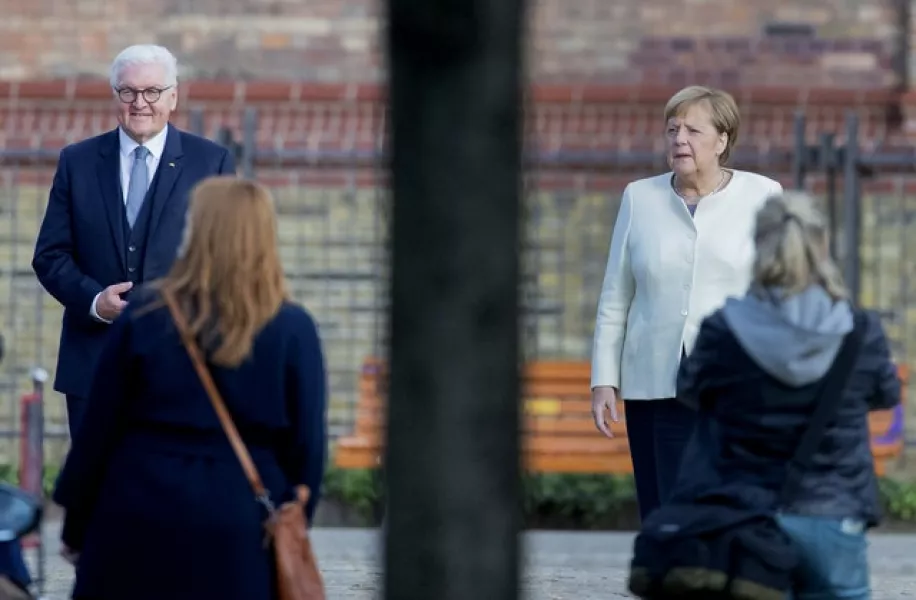Frank-Walter Steinmeier and Angela Merkel (Christoph Soeder/dpa/AP)