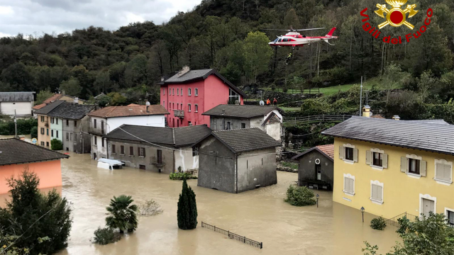 French Rescuers Search For Eight Missing In Floods After Two Killed In Italy