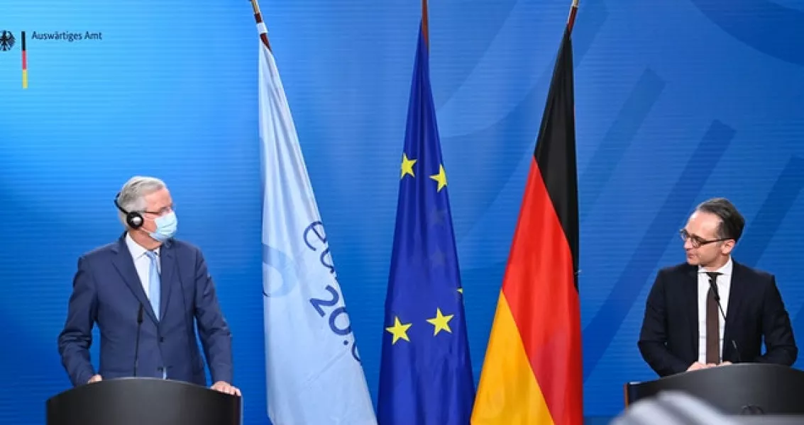German Foreign Minister Heiko Maas, right, and EU chief Brexit negotiator Michel Barnier (Tobias Schwarz/Pool via AP)
