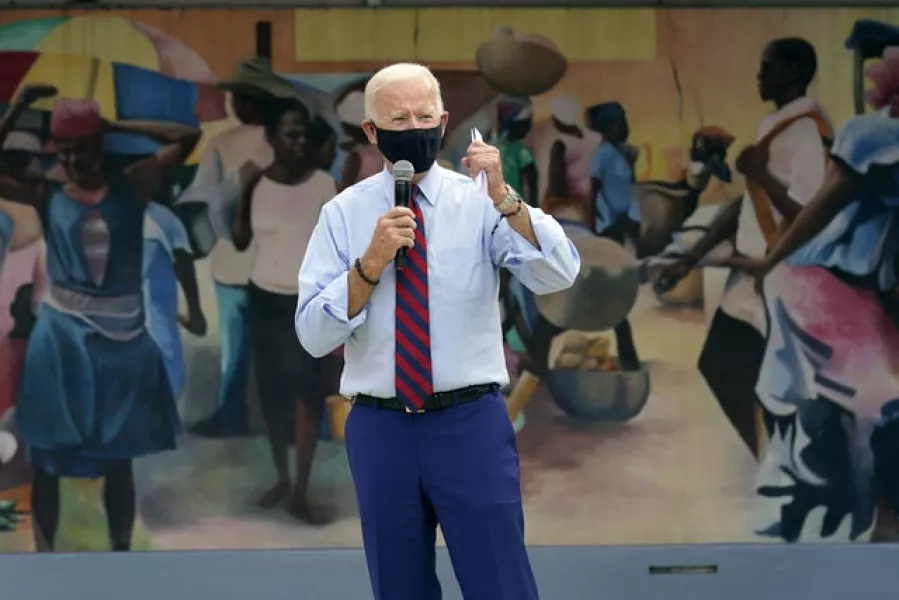 Joe Biden speaks at the Little Haiti Cultural Complex in Miami (Andrew Harnik/AP)