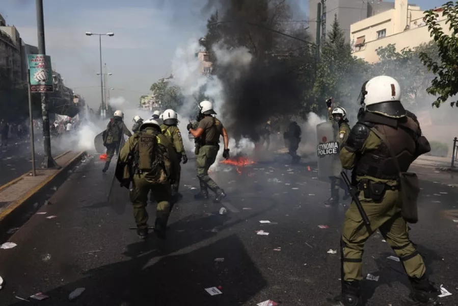 Greek riot police officers during a rally outside the courthouse in Athens (Yorgos Karahalis/AP)