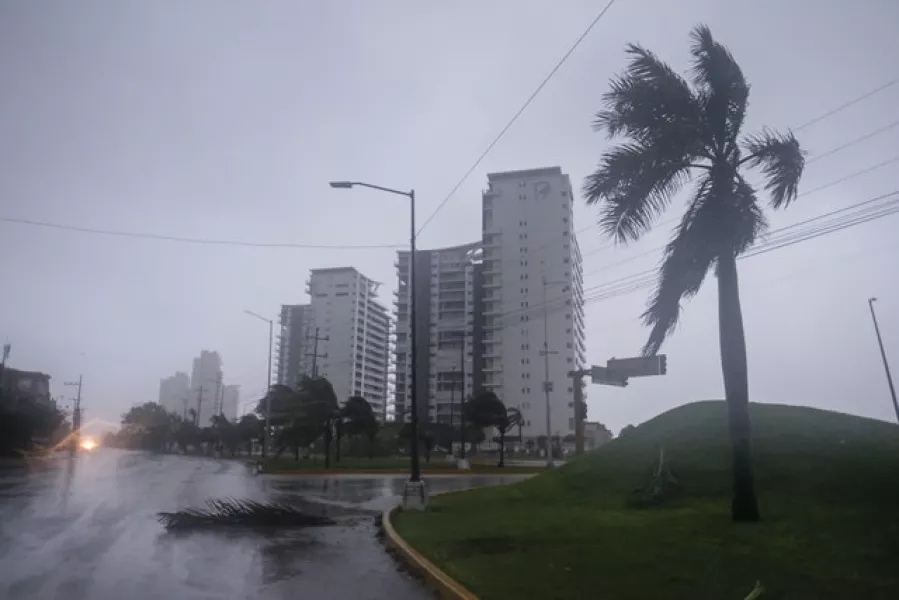 A flooded street in Cancun, Mexico, as Hurricane Delta made landfall on Wednesday (Victor Ruiz Garcia/AP)
