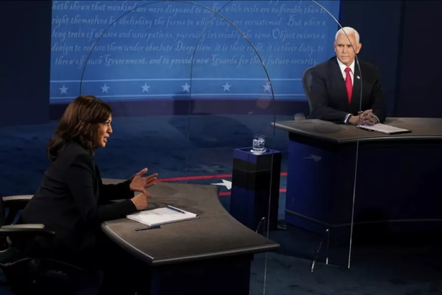The two candidates face off at the start of their debate (Morry Gash/Pool/AP)