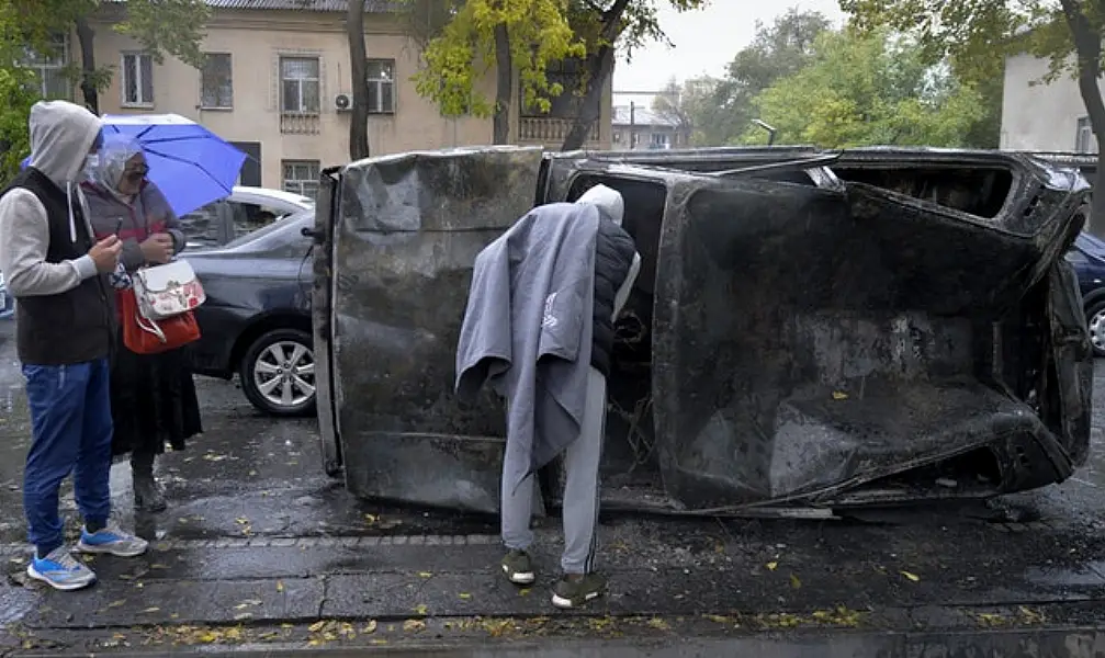 Protesters near government headquarters in Bishkek (Vladimir Voronin/AP)