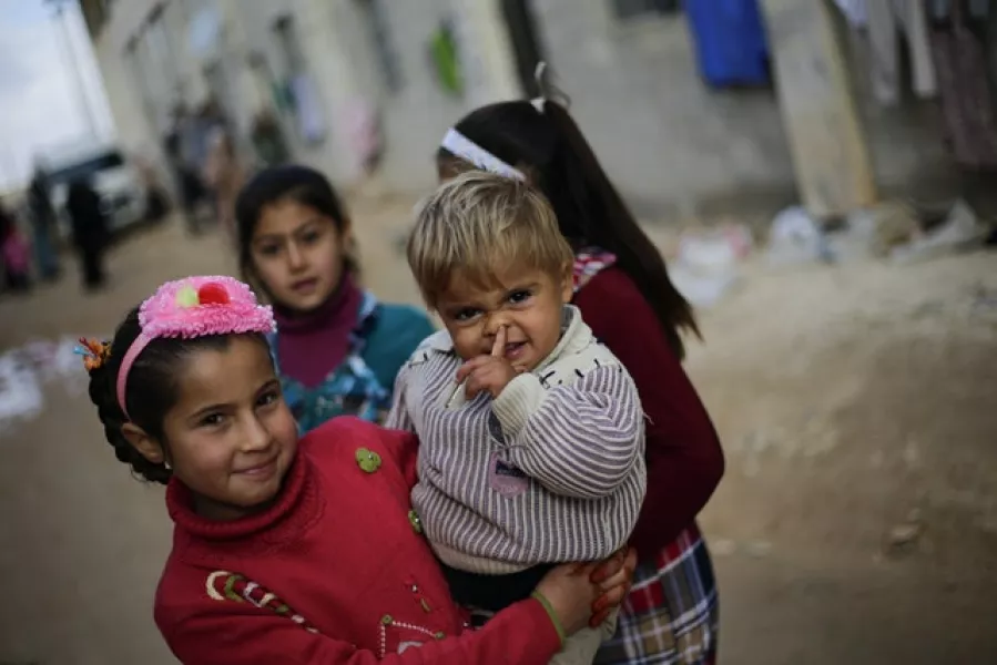Syrian children displaced from eastern Aleppo (Hassan Ammar/AP)