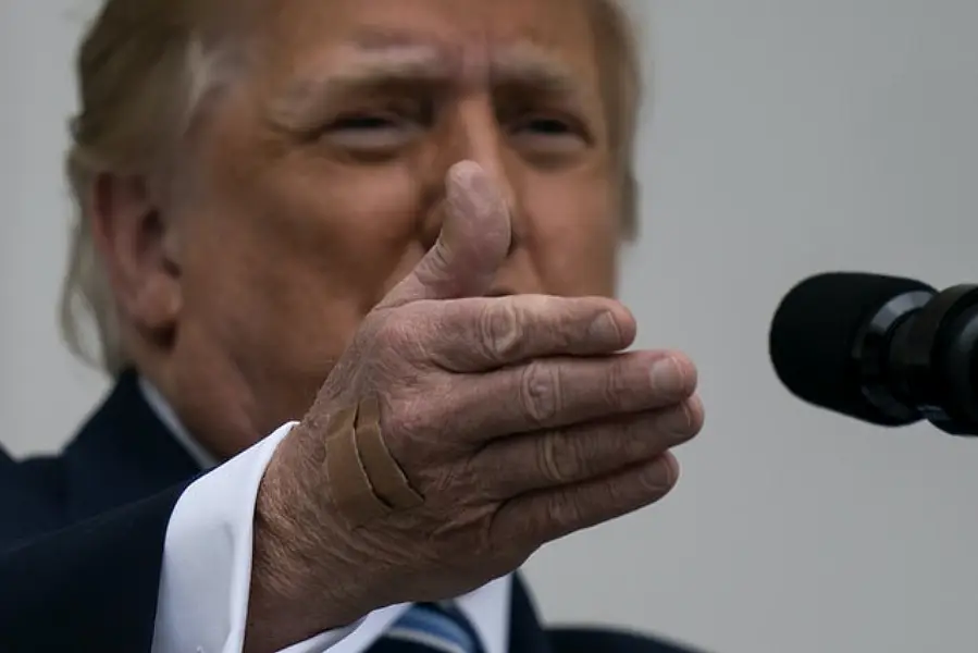 President Donald Trump gestures while speaking (Alex Brandon/PA)