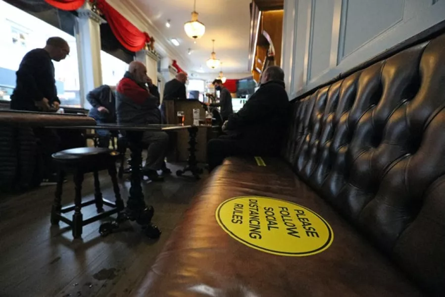 Social distancing in a pub in Liverpool. Photo: Peter Byrne/PA
