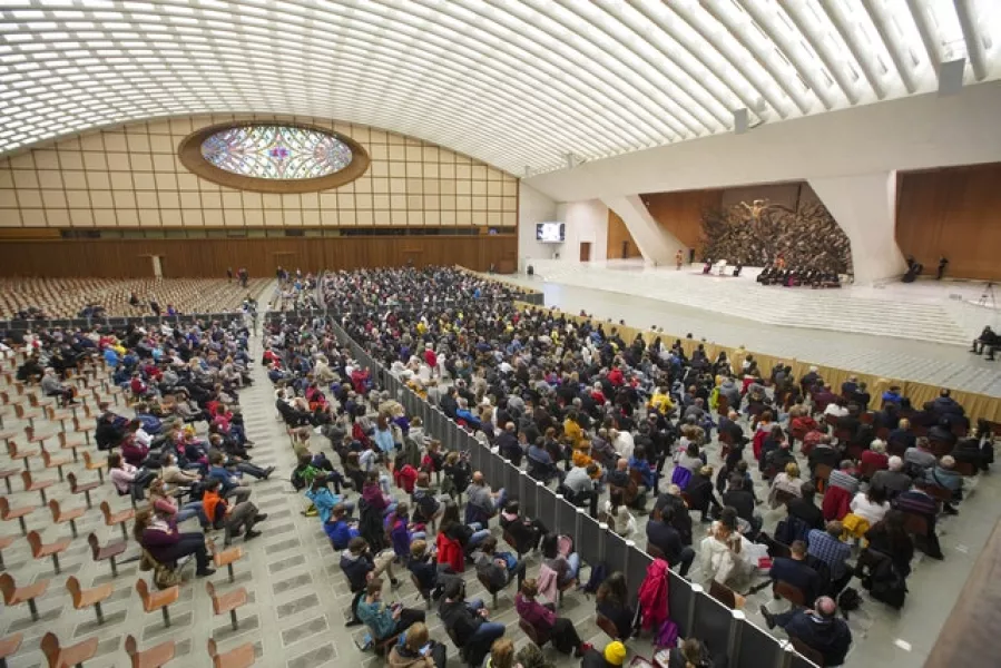 The faithful attend Pope Francis’ weekly general audience in the Pope Paul VI hall at the Vatican (Andrew Medichini/AP)