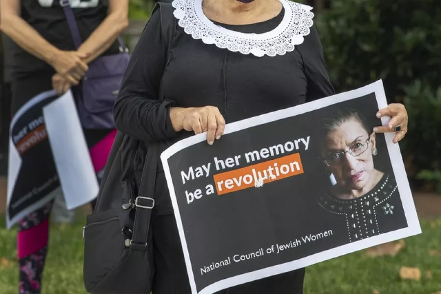 A placard bearing the image of Ruth Bader Ginsburg (Jose F. Moreno/AP)