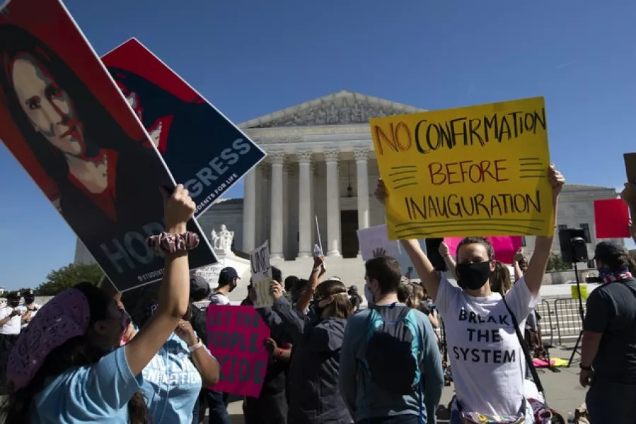 People protest for and against the confirmation of President Donald Trump’s Supreme Court nominee Amy Coney Barrett (Jose Luis Magana/AP)