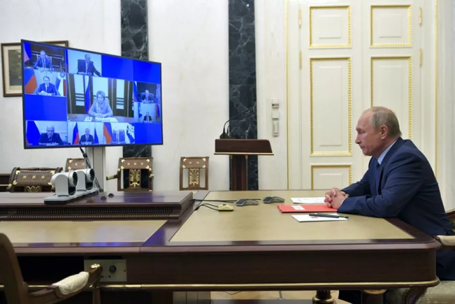 Russian President Vladimir Putin chairs a security council meeting via video conference in Moscow, Russia (Alexei Druzhinin/AP)