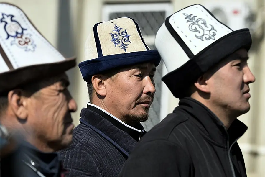 Protesters wearing Kyrgyz national hats (Vladimir Voronin/AP)