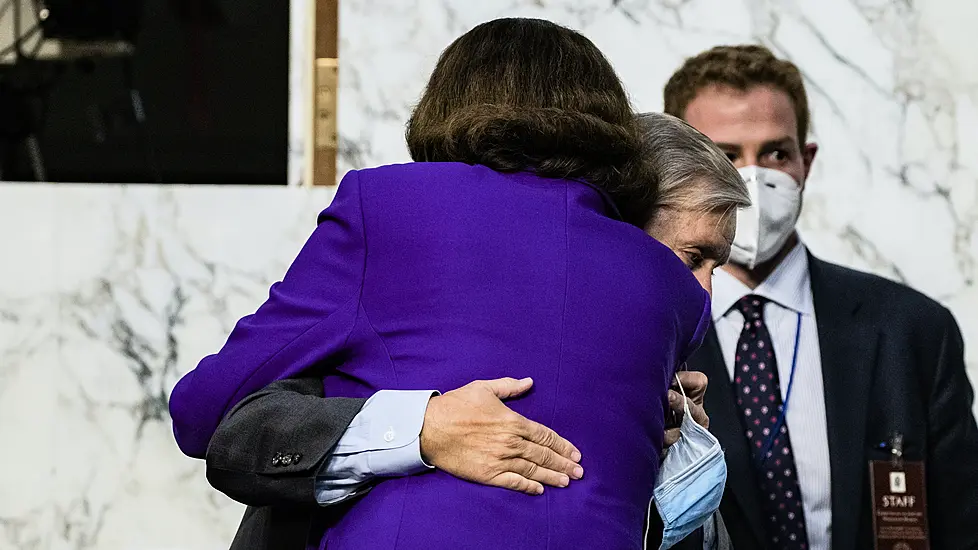 Democratic Senator Condemned By Allies For Hugging Republican Rival