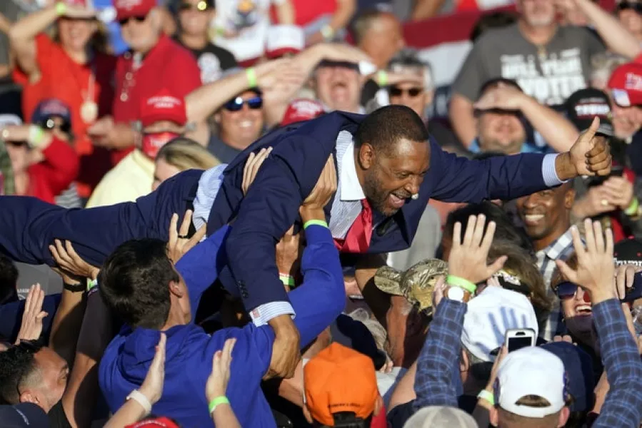 Georgia state Representative Vernon Jones crowd surfs during a campaign rally for President Trump at Middle Georgia Regional Airport on Friday (John Bazemore/AP)