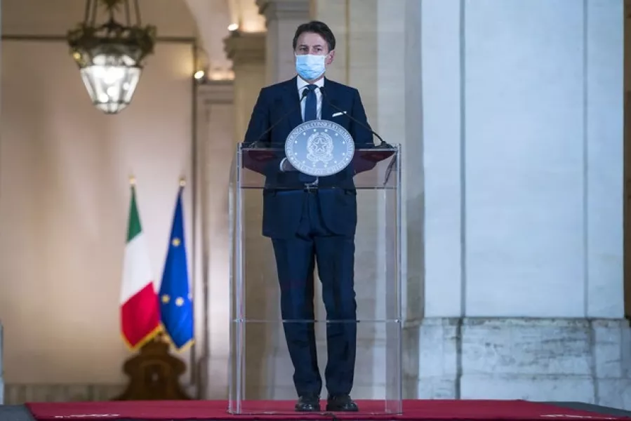 Italian Premier Giuseppe Conte announced new measures as the country’s daily infections doubled within a week (Angelo Carconi/Pool/AP)