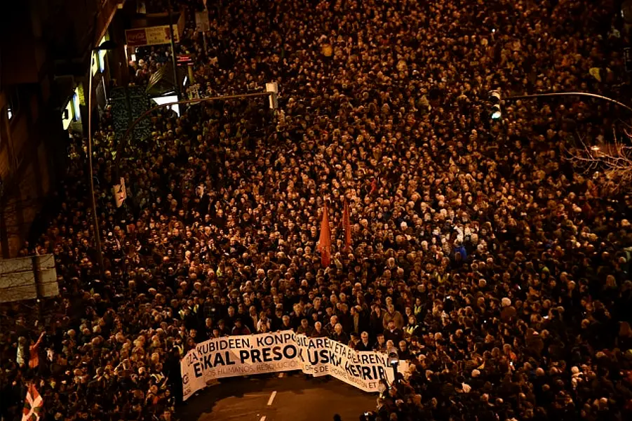 Demonstrators in 2016 hold a banner that reads in Basque language, ‘All rights for the Basque prisoners’ (AP)