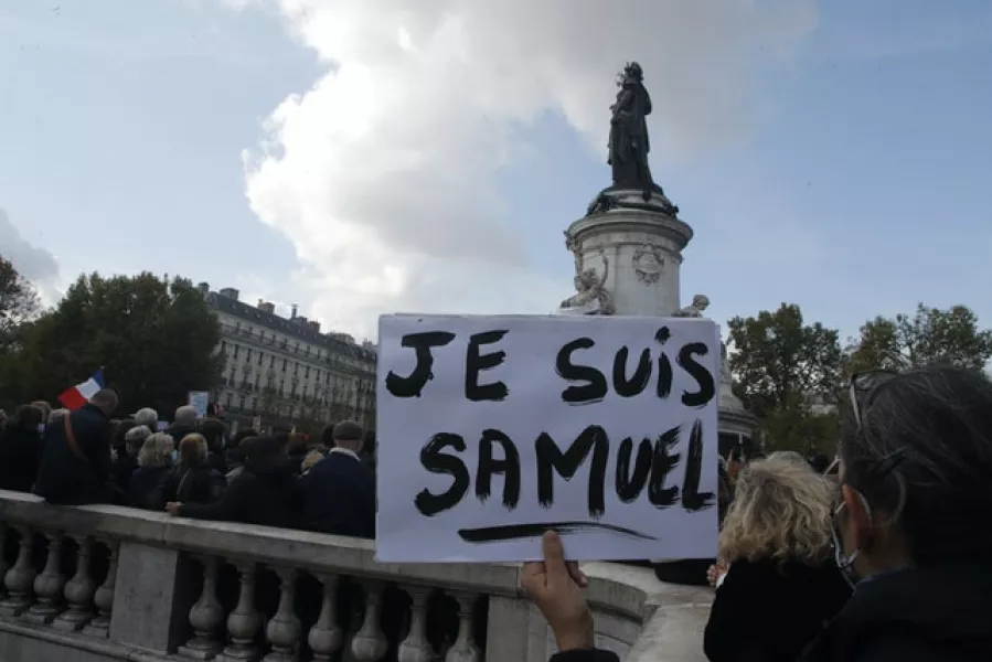 A man holds a poster reading ‘I am Samuel’ during a demo on Sunday (Michel Euler/AP)