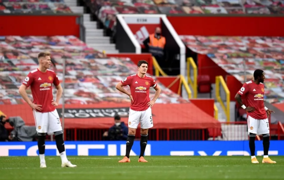 Manchester United players are dejected during their 6-1 home defeat to Tottenham (Oli Scarff/PA)