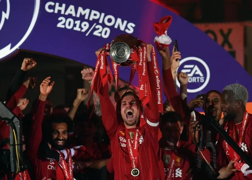 Liverpool captain Jordan Henderson lifted the Premier League trophy on Wednesday. (Paul Ellis/PA)