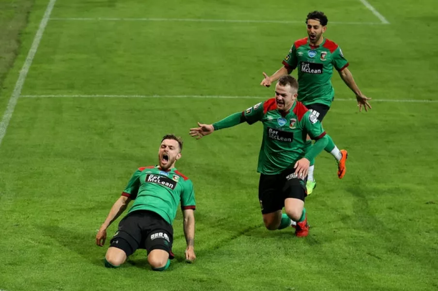 Robbie McDaid, left, was the match-winner at Windsor Park (Liam McBurney/PA)