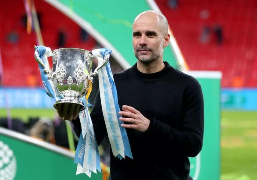 Guardiola has got used to collecting cups (Mike Egerton/PA)