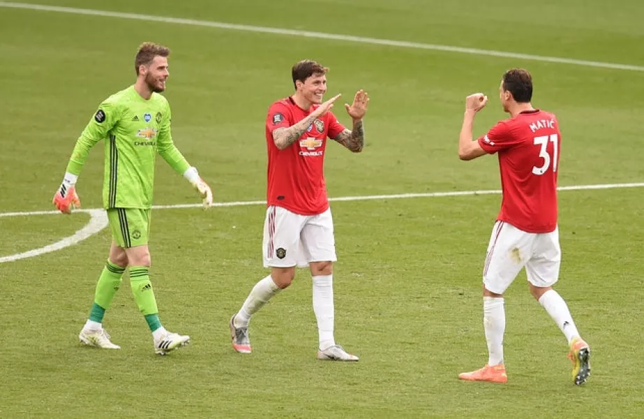 David De Gea, Victor Lindelof and Nemanja Matic celebrate after securing third spot with their win at Leicester (Oli Scarff/PA)