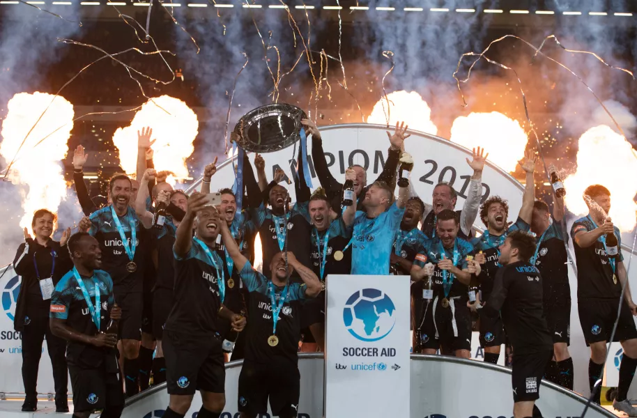 Soccer Aid World XI celebrate winning following the Soccer Aid match at Stamford Bridge last season. (Soccer Aid)