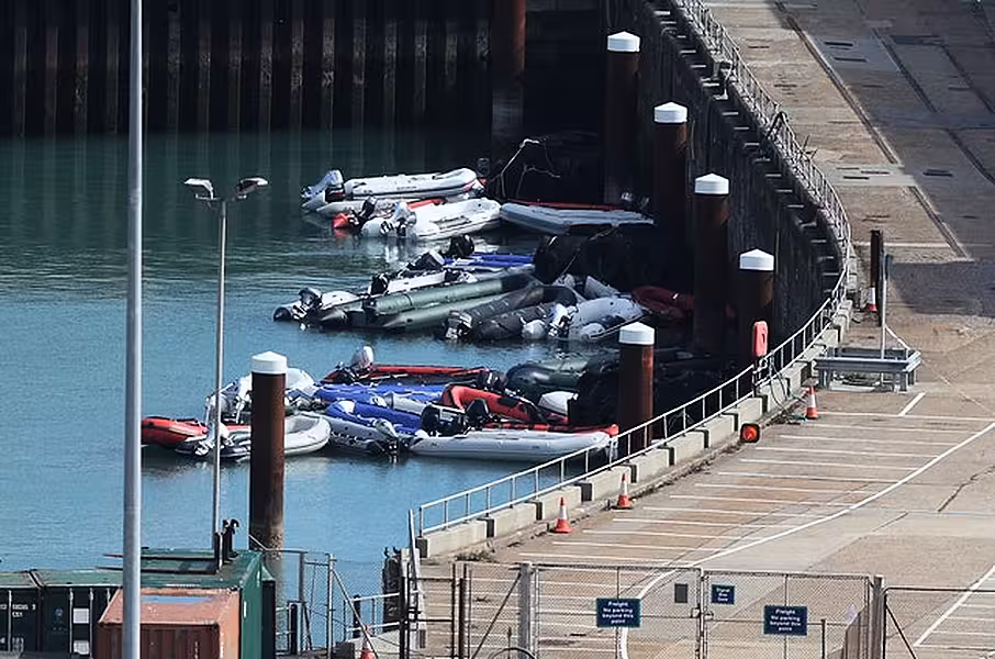 Dinghies and Ribs are moored up at Dover harbour. Photo: Andrew Matthews/PA