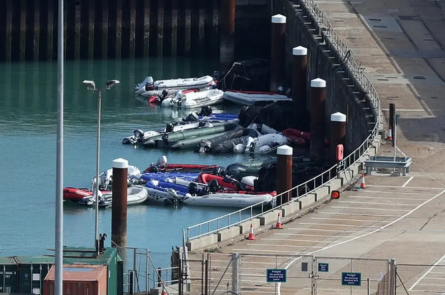 Dinghies and Ribs are moored up at Dover harbour. Photo: Andrew Matthews/PA